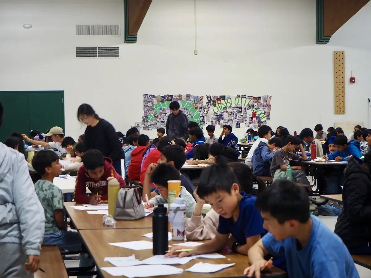 Team members working through a proof
