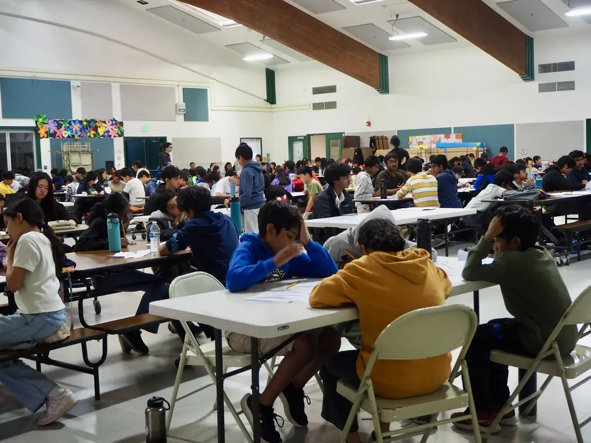 Students celebrating a solved problem